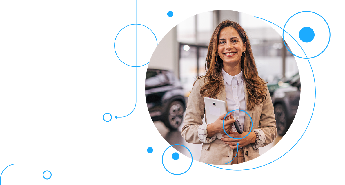Car saleswoman smiling and holding a tablet and car keys