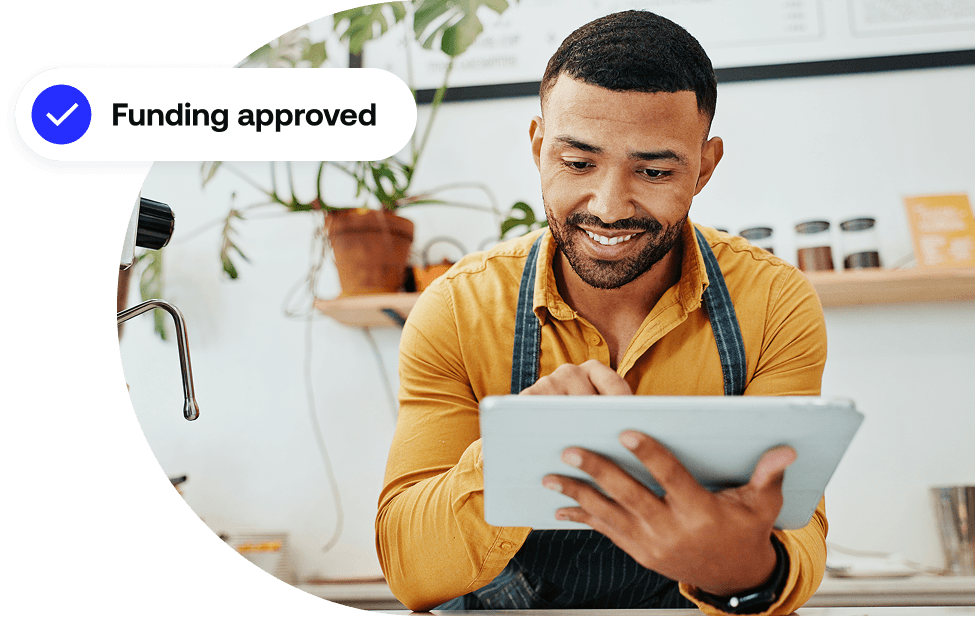 A business owner applies for Flexible Funding from a mobile tablet.