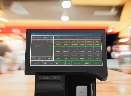 Countertop enterprise POS showing a point of sale screen with sample food order ticket