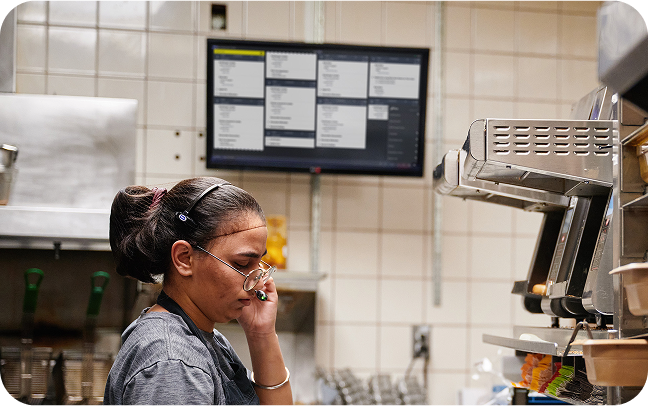 Back of house restaurant worker takes an order