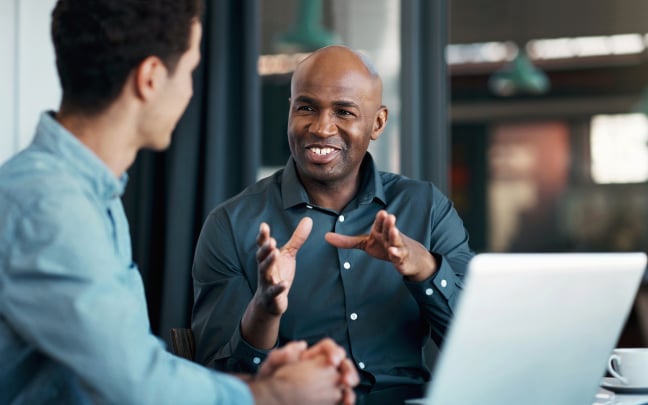 An Global Payments agent connecting with a customer