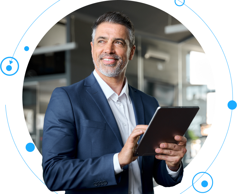 A financial institution owner smiling while holding a tablet