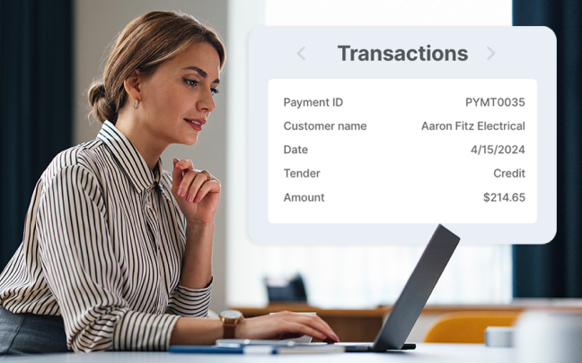 A client reviewing transactions on her laptop