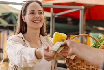 Customer giving restaurant server a credit card