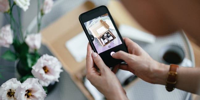 Close-up of woman's hands holding a mobile phone