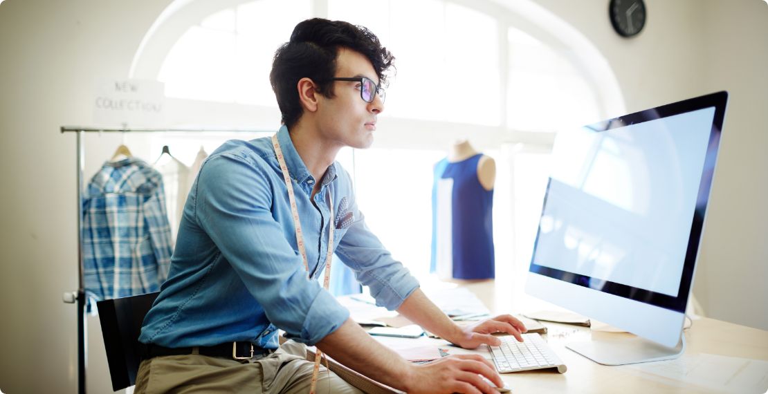 Man on a desktop computer