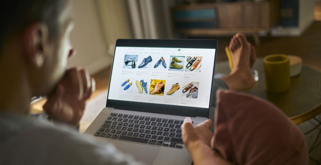 Business owner looking at a laptop