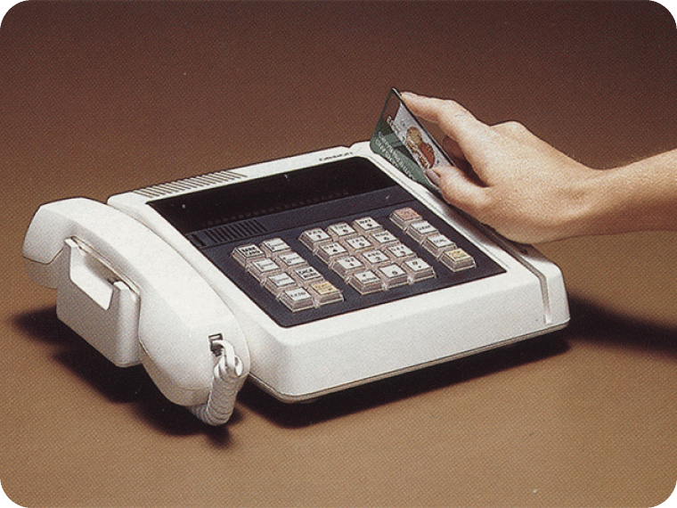 Credit card being swiped on 1980s POS terminal