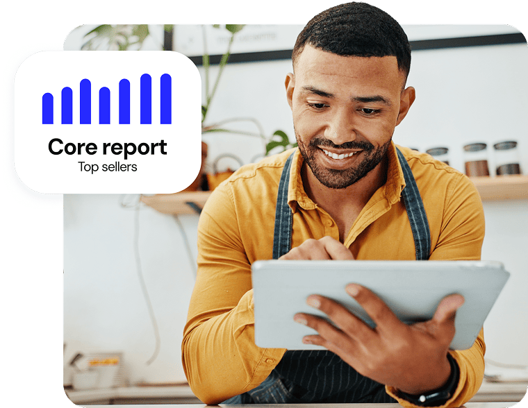A man using a digital tablet with a "Core report Top sellers" graphic overlay