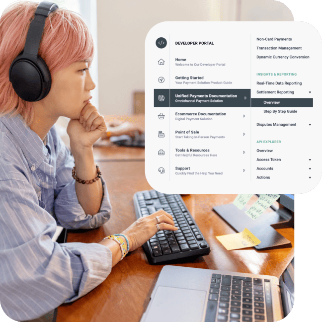 Woman with pink hair typing at a desk with an overlaid Developer Portal menu.