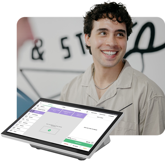 An image of a person wearing a headset reviewing orders on a kitchen display system."