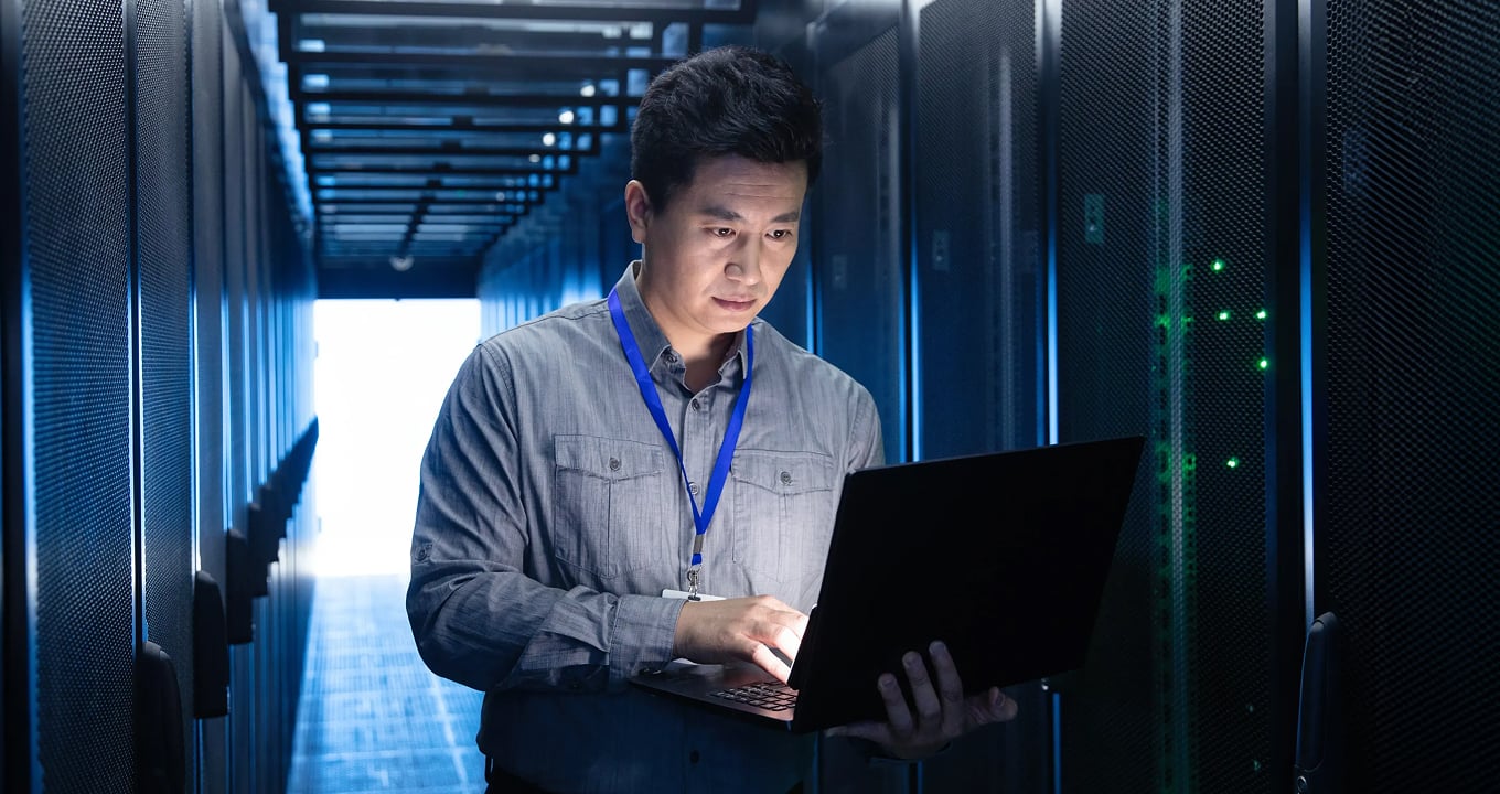 A person reviews payment security information on their laptop.