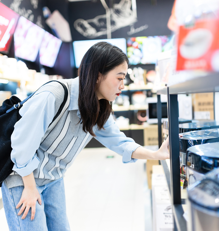 A customer browses products in a store.