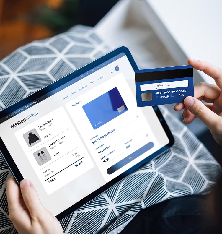 An online shopper enters their credit card details into online checkout fields.