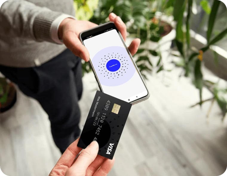 Contactless card payment being processed directly on a mobile phone.