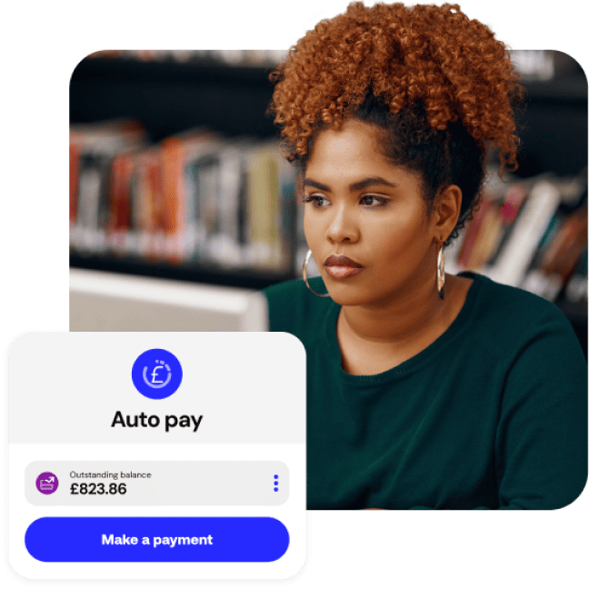 A student in a library using education payment software to pay their balance.