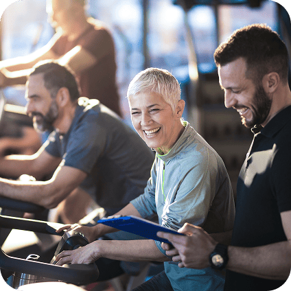 Diverse group of experts sharing ideas at a high-energy business gathering at gym