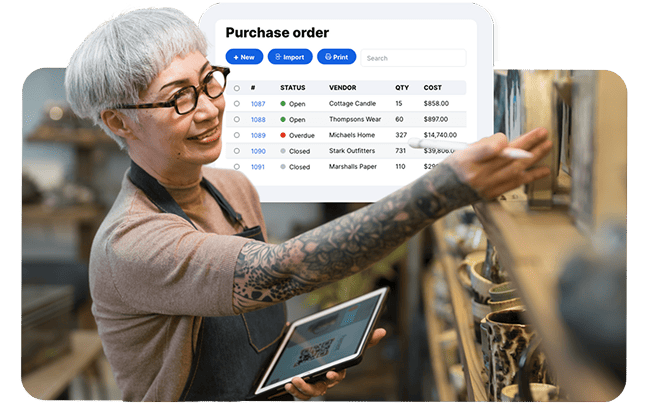 Older woman doing inventory in a small shop using a tablet device