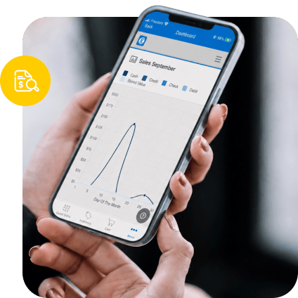 Gros plan sur l'interface d'une application mobile affichant un graphique linéaire des performances de vente sur un smartphone.