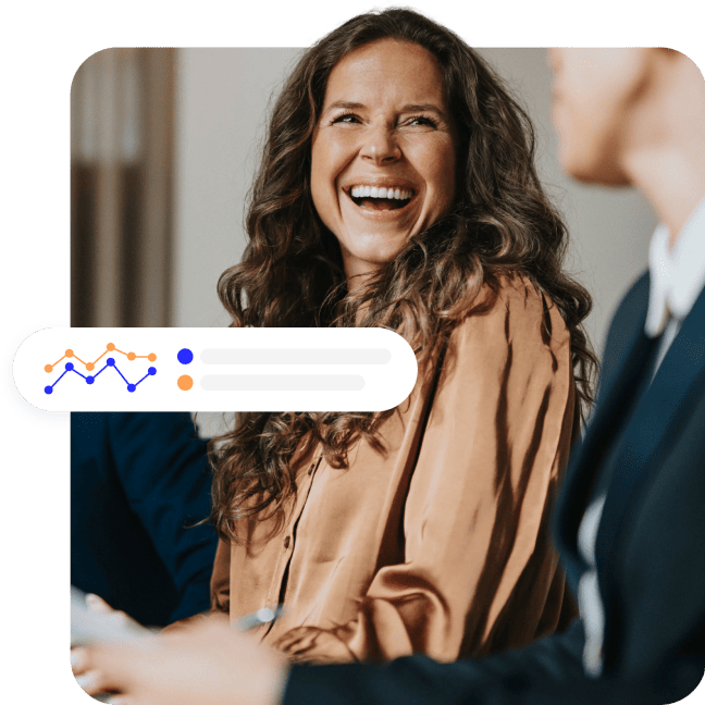 Laughing woman during a business meeting next to a line chart analytics badge.