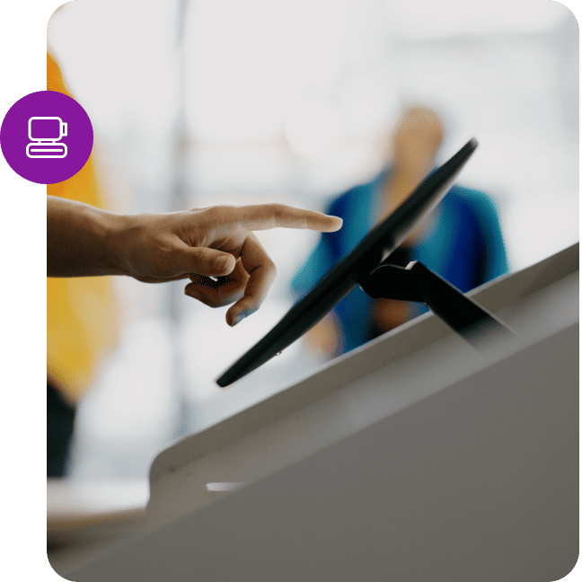 Close-up of a hand pointing at a tablet POS screen, with a purple POS badge overlay