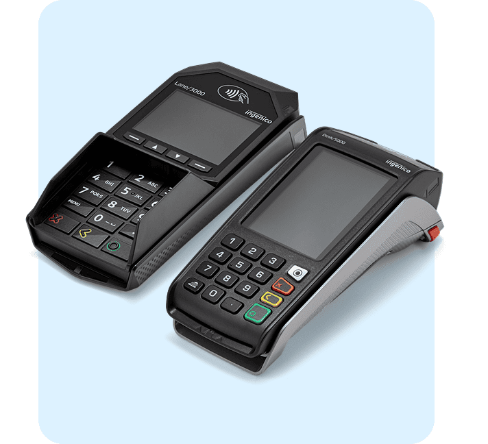 Two Ingenico credit card payment terminals displayed side by side.