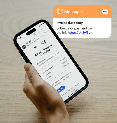 Smartphone screen showing an invoice email next to an invoice payment notification popup.