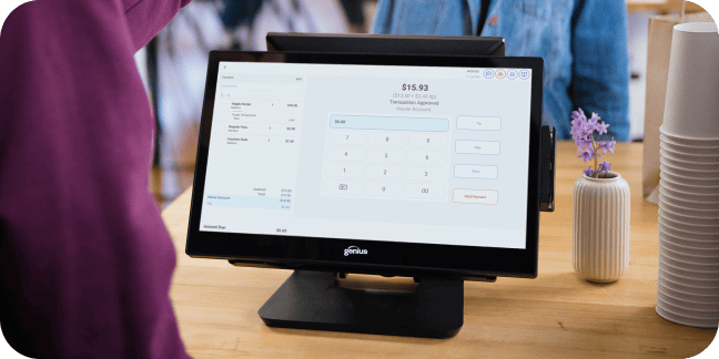 A point-of-sale touchscreen terminal displays a transaction total of $15.93