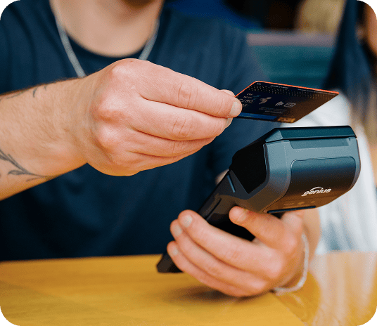 Customer paying with card reader