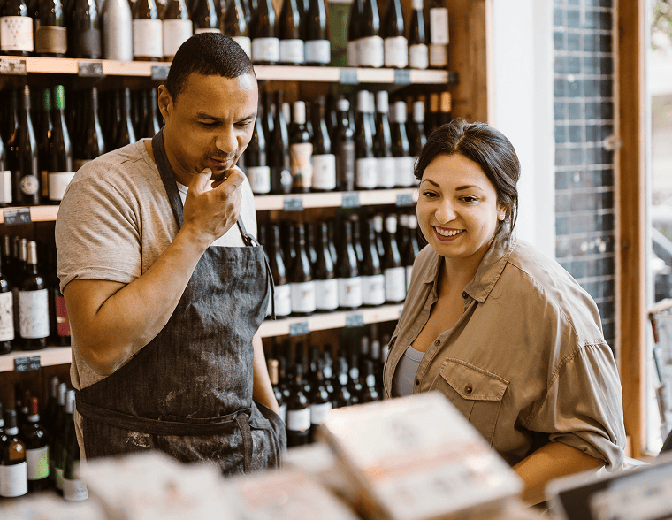 Retail staff in liquor store