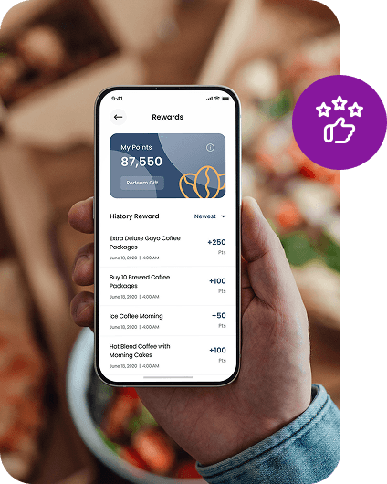 A customer viewing loyalty rewards and points on a mobile phone.